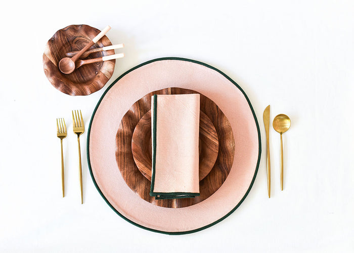 Overhead View of Coordinated Fundamentals Place Setting Set on Blush and Pine Color Block Round Placemat