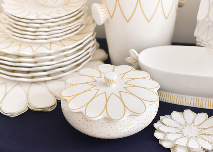 Cropped Close up of Stacks of Deco Pieces including Deco Gold Scallop Covered Bowl