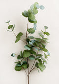 A faux green eucalyptus spray.