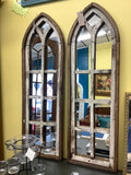 Mirror backed pointed window
