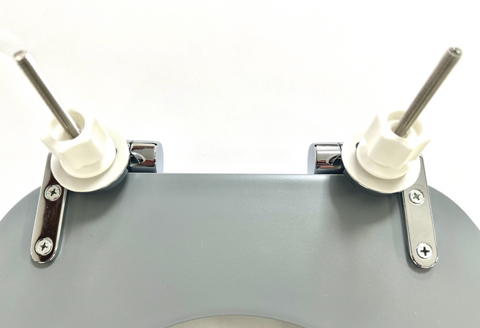 Harbour Housewares soft-close tongue and groove MDF wood toilet seat underside, showing fittings in place, pre-installation